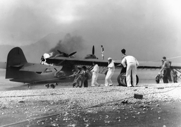 Sailors_trying_to_save_PBY_at_NAS_Kaneohe_Bay_1941.jpg