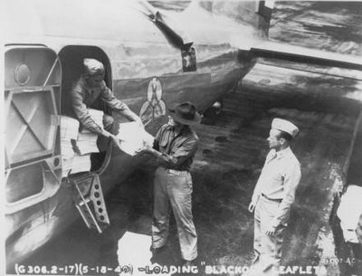 neg_0655_loading_leaflets_on_B-18_May1940.jpg